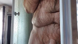 Shower after pissing on my hairy body. Some cock play