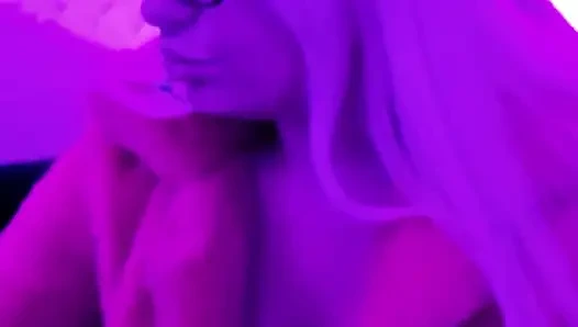 Smoking doll in fur and latex