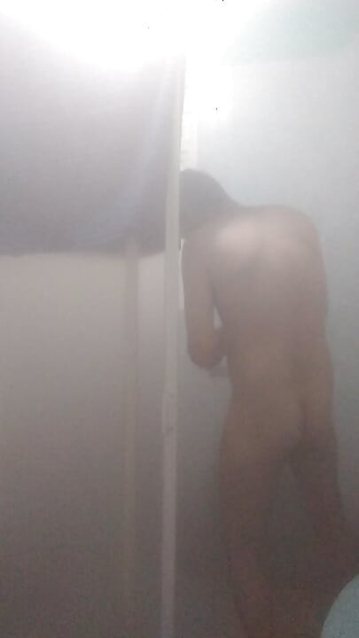 Naked man in shower