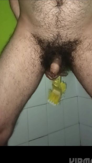 Indian middle age man use toilet brush and free hand cum 
