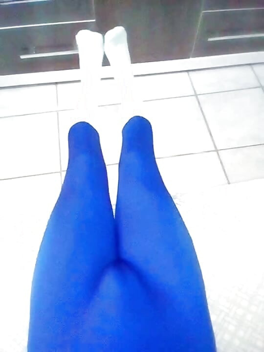 Fun at home wearing a blue Zentai costume with socks