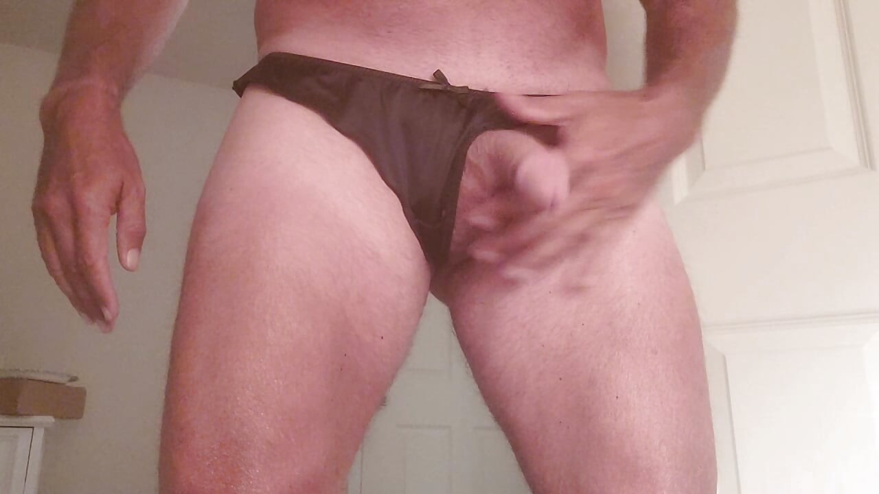 Anal play in my black satin thong.