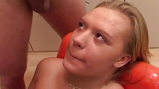 A stunning blonde babe from Germany gets smashed by two hard cocks
