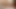 the wife massages the penis and balls, then sucks the dick and gets a mouthful of hot cum