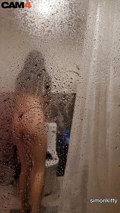 Check out this steamy shower scene with hot naked Simon