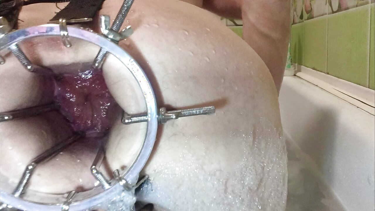 Large anal mirror. Spreading her anal wide. Close-up view of anal from the inside