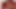 Long-haired ladyboy in sadals exposes her small dick and
