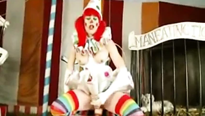 Shemale Clown Takes Huge Dildo at the Circus
