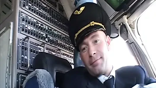 Randy pilot fondles sexy brunette in the cockpit