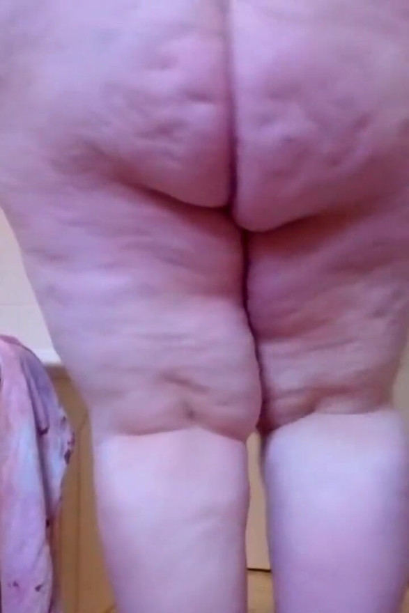 Naked SSBBW cleans lower camera view