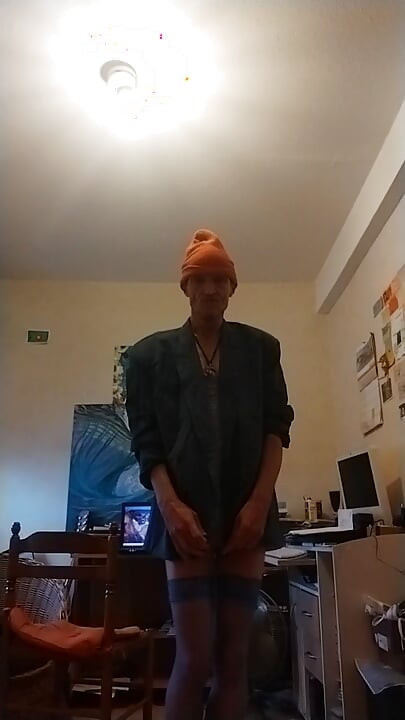 In a very short and naked little blue dress, the sexy little slut!!