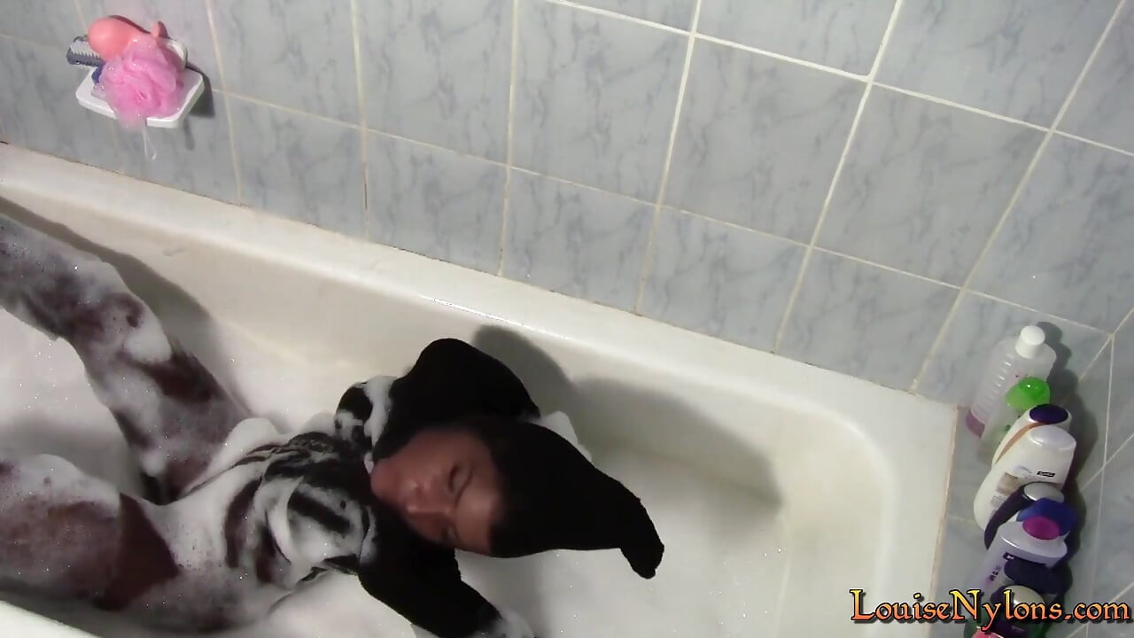 Sexy Louise, totally encased in pantyhose getting a bath