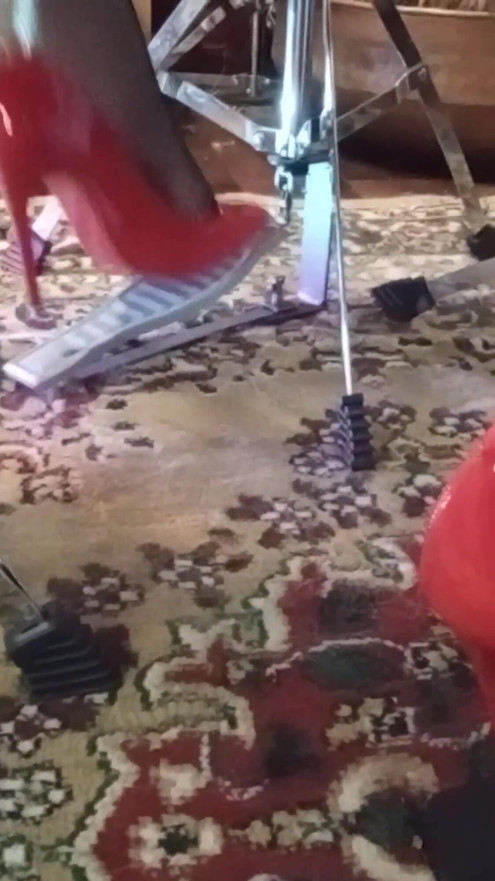 I Play Drums with My New Red Stilleto