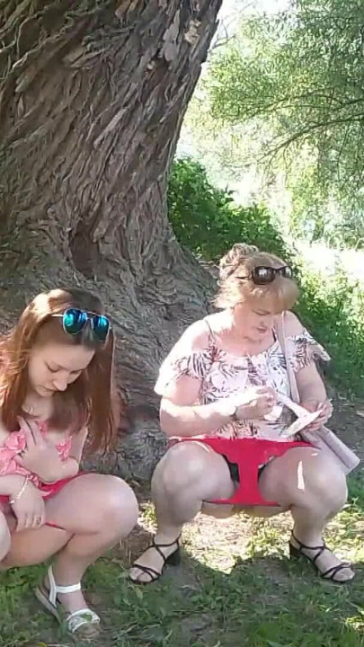 Two women girl and mature milf took off red panties peeing on side of road in public Pee Outdoor Outside  Lesbians kiss | Clip 1
