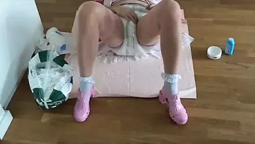 Sissy Maid changes her diapers ...