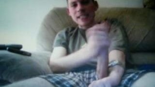 young guy on cam jerking his huge cock