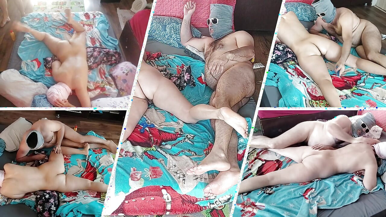 Foreplay in the bedroom with an amateur couple.