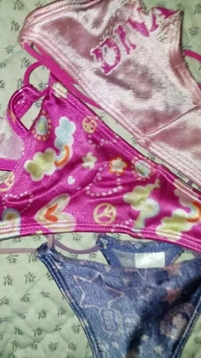 Unloading on satin thong