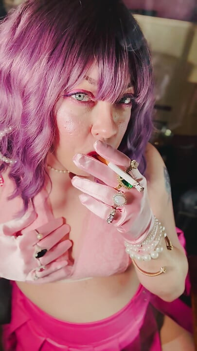 A Cute Tina Snua Tip To Tails 2 Cigarettes With Lots Of Smoke Rings In Satin Gloves & Jewellery