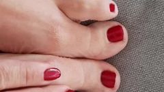 Red nails and beautiful feet