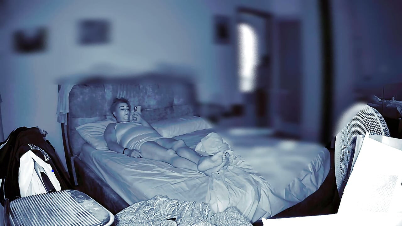 Wife Secretly Masturbates in the Room While Her Husband Is at Home and Watches Her