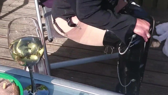 Outdoors in Fife in my patent thigh  boots and sheer tights.