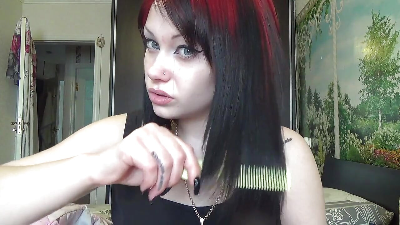 Brushing my hair with little and big brush and by long nails
