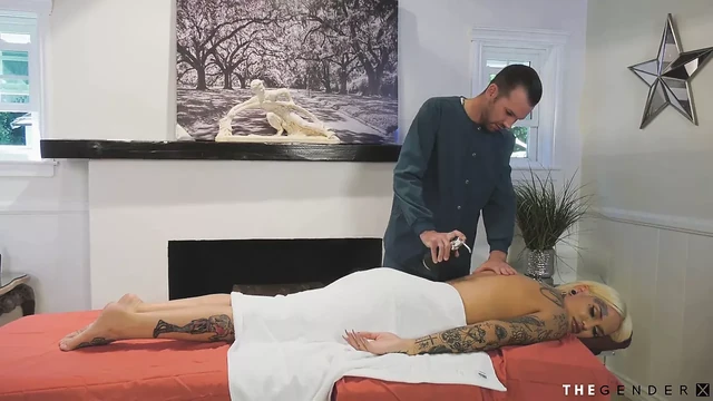 Massaged inked transbabe teasing masseur with BJ