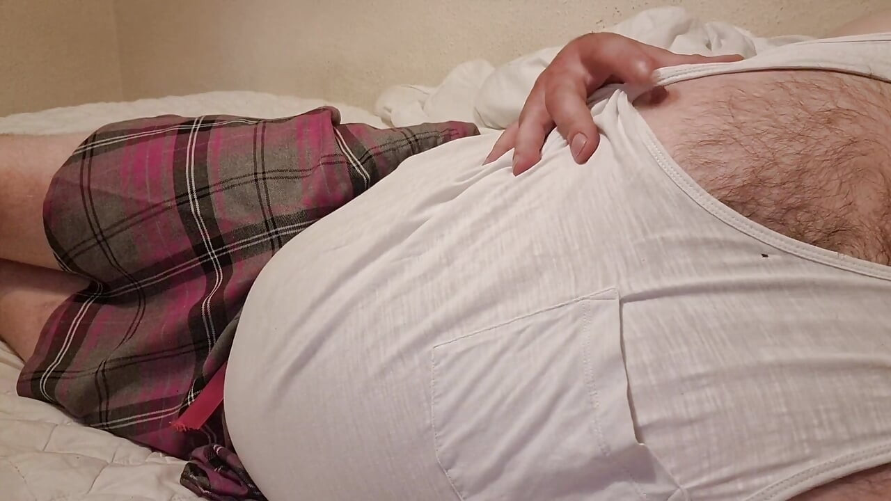 sexy sissy in mini skirt showing sexy ass