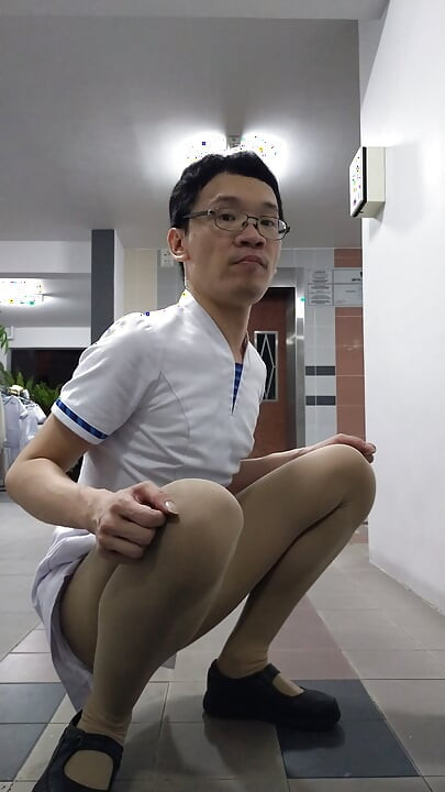 Wearing singhealth nurse dress, nurse pantyhose and nurse shoes.