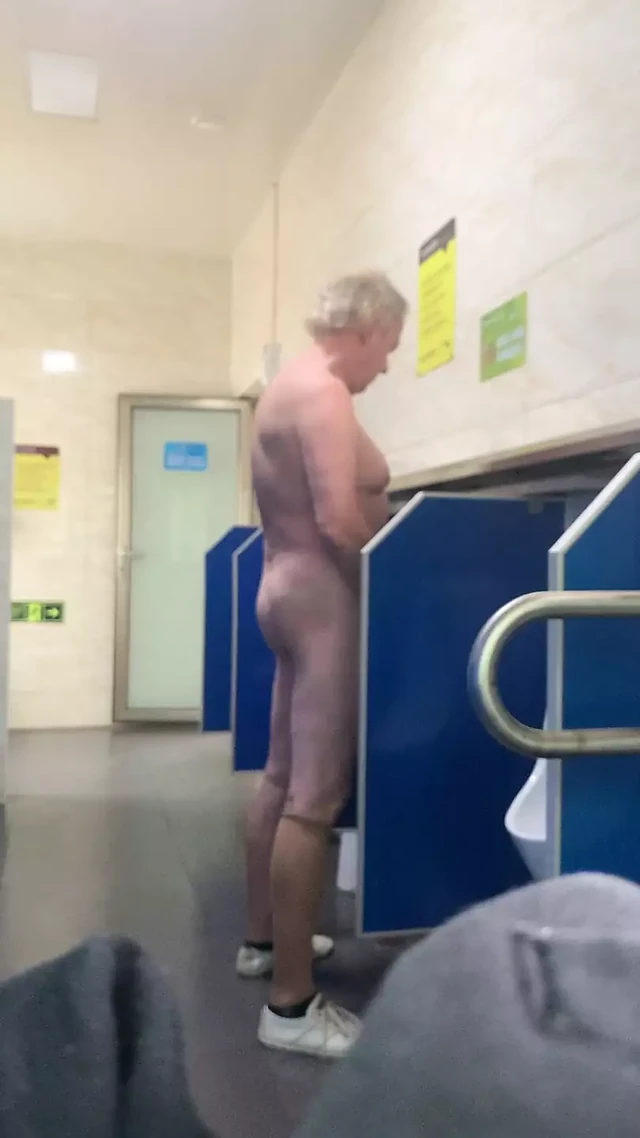 Naked jerk off in public toilet