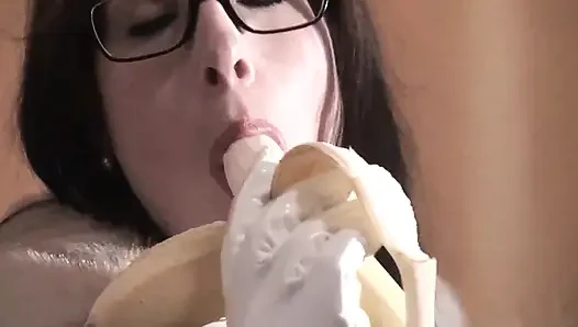 Spex brunette talking dirty while eating banana