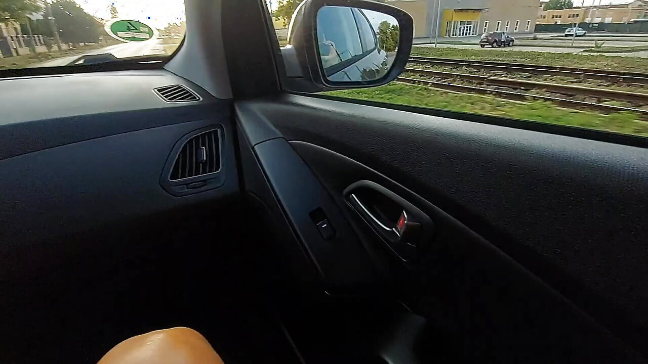 Horny stepmom rubs her pussy in the car in public in front of her stepson