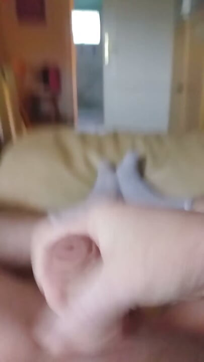 Lying on the couch and jerking off me waiting for someone to help