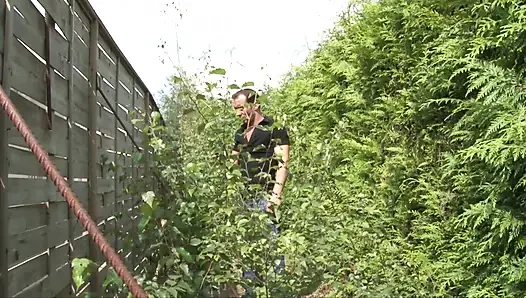 Young brunette outdoor ass fucked in a garden