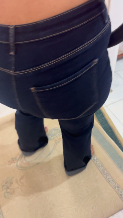 Curvy woman cleaning the house in trousers | Clip 1