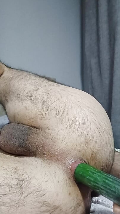 Hairy Turkish boy satisfies his hole with cucumber
