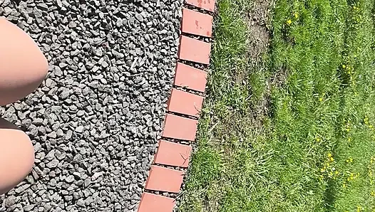 Sexy hot stepmom is horny and caresses herself on a park bench