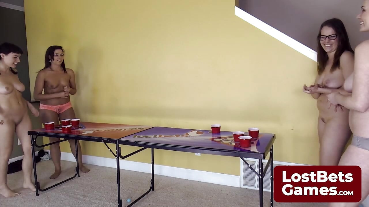 Four hot lesbians playing a Strip Air Pong game