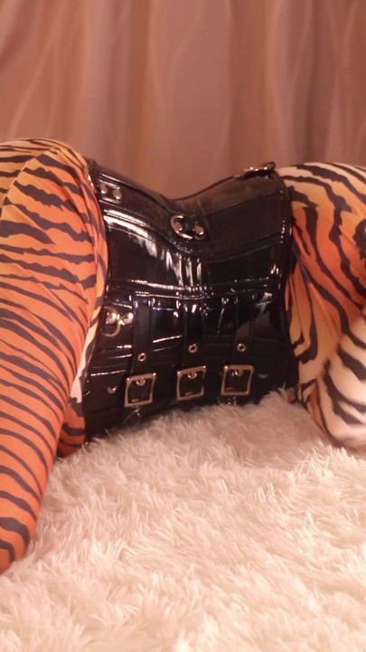 Submissive MILF gagged and bondage taped in spandex catsuit