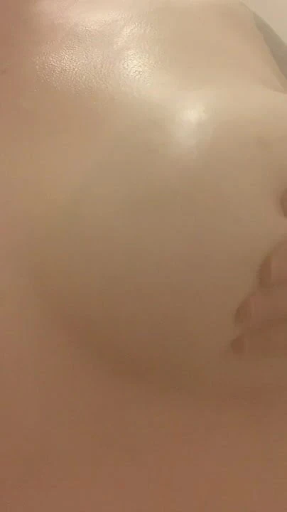 Busty babe in shower