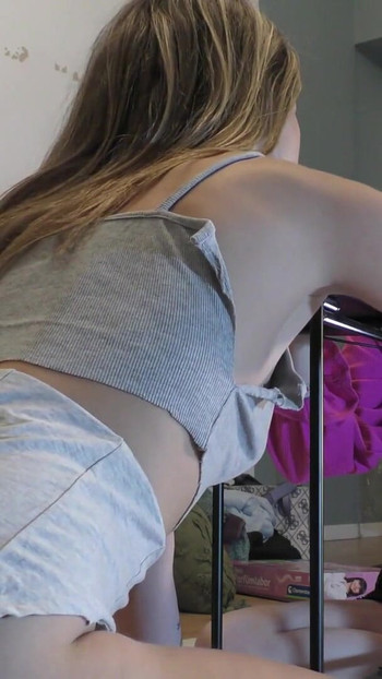 Emotional moment from "Two Girl play Mini Bowling Game without any Underwear or Bra"
