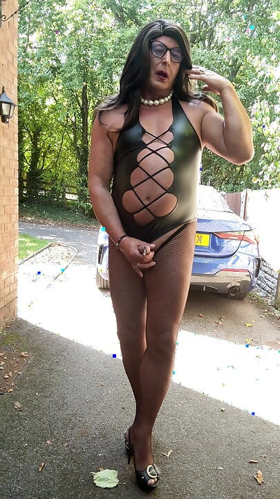 Sexy Crossdresser Kellycd2022's in black pvc bodysuit and fishnet pantyhose