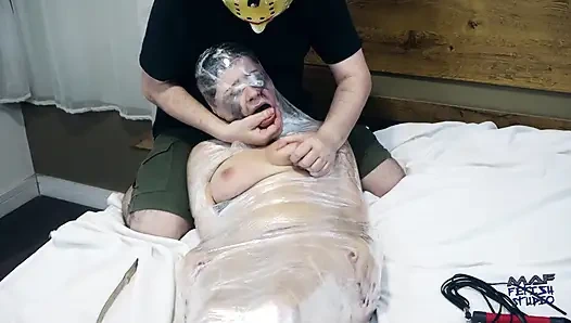 Gabriela in Mummification with Plastic Wrap, Whipping, Bastinado and Tickling
