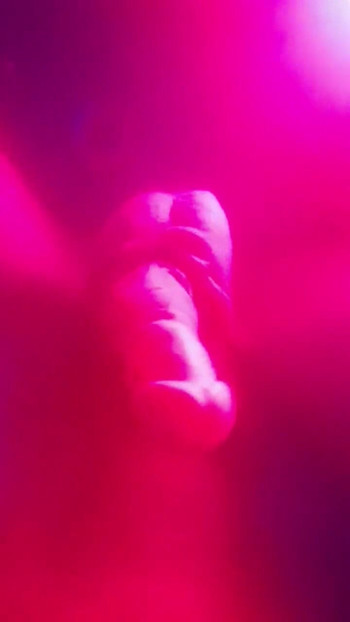 My dick under water in color changing light