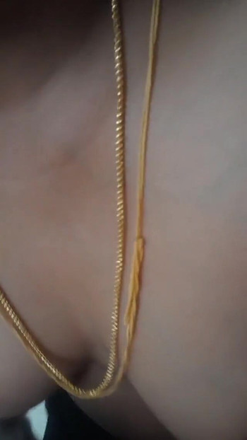 Key moment from "Swetha Tamil desi wife nibbles clamp and pussy masturbation part 2"
