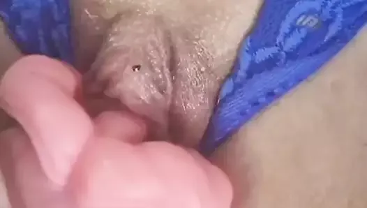 Blue-eyed blonde Spanish milf subscribing her big clit in close-up, juicy pussy