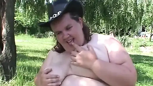 Watch this fatty slut rides her toy and then gets banged outdoors