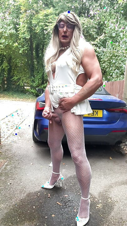 Sexy Crossdresser kellycd2022 in sexy white mini dress and fishnet pantyhose and heels