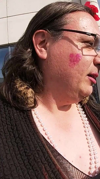 Emotional moment from "Dirty sexy Sissy Crossdresser Is showing of in the carpark near the highway"